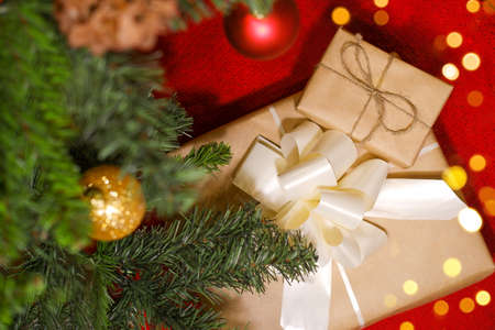 Christmas decoration with gift boxes, colorful christmas balls and christmas treeの写真素材