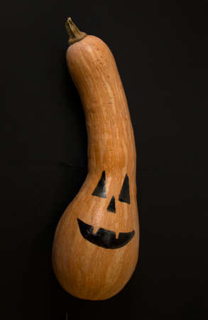Halloween composition with pumpkins on a black background . Greeting card template.の写真素材