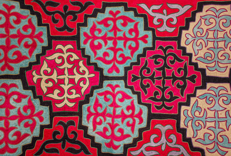 Kazak felt carpet with ornament on the wall of the yurtの写真素材