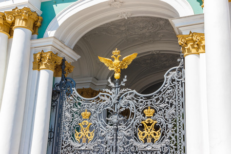 Wrought iron gates to the Winter Palace Hermitage with a two-headed eagle symbol of Tsarist Russiaのeditorial素材