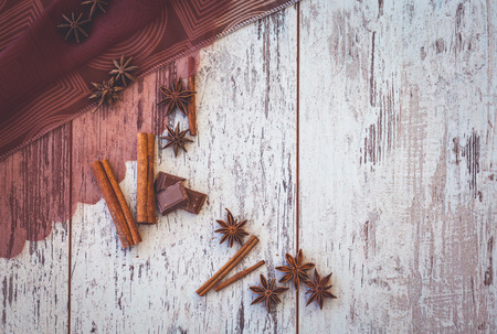 chocolate and spices on decorated copper with napkin の写真素材