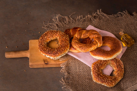 Variety of delicious Turkish bagels with sesame seeds and cereals.