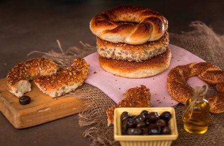Variety of delicious Turkish bagels with sesame seeds and cereals.