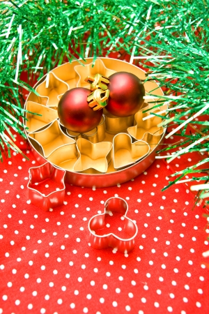 Pastry cutters and christmas balls の写真素材