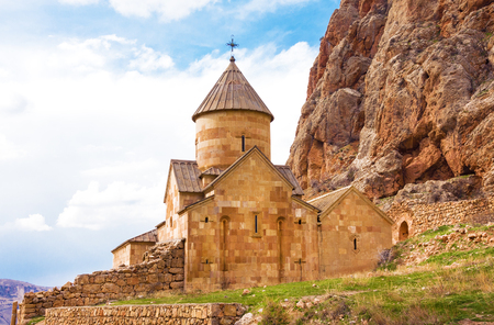 Scenic Novarank monastery in Armenia. Noravank monastery was founded in 1205. It is located 122 km from Yerevan in a narrow gorge made by the Darichay river nearby the city of Yeghegnadzor.の写真素材