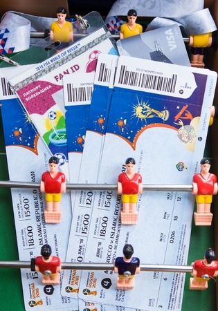 Moscow, Russia - June 8, 2018: Preparing to enter matches of confederations Cup in 2017 and World Cup 2018 in Russia. Fan set - tickets, credit card Visa and id-card on toy footballのeditorial素材