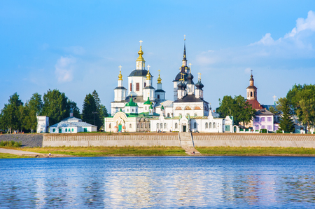 Famous churches in summer. View of historical centre of Veliky Ustyug from Sukhona river, Russiaの写真素材