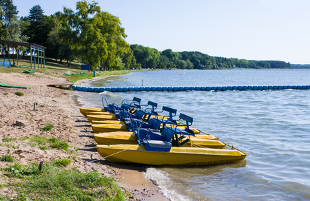 Walking water catamarans on lake shore, Narochの写真素材