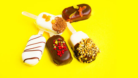 Sweet  on yellow background. Mini dessert close up.