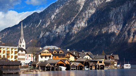 Hallstatt - Heritage village against mountain and lake in winter. It`s most popular, romance and dream of destination for many tourists. Austria.の写真素材