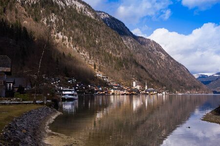 Hallstatt -  Heritage village against mountain and lake in winter. It`s most popular, romance and dream of destination for many tourists. Austria.の写真素材