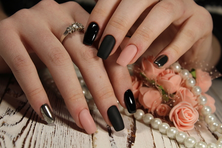 beautiful long nails delicate manicure pearl beadsの写真素材