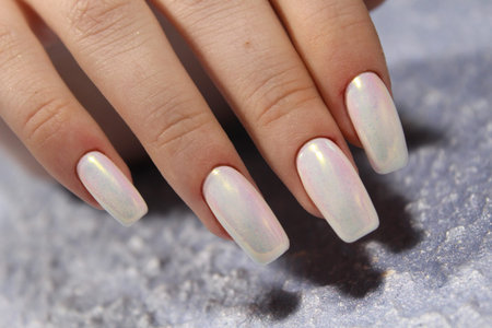 sexy manicure on long nails on a beautiful background