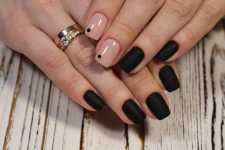 fashionable female manicure gel varnish with beautiful designの写真素材