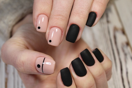 fashionable black manicure on long beautiful nailsの写真素材