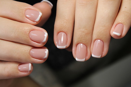 Stylish manicure nails color black and silverの写真素材