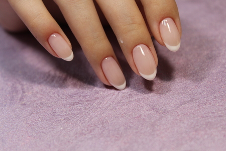 glamorous beautiful manicure on a trendy texture backgroundの写真素材