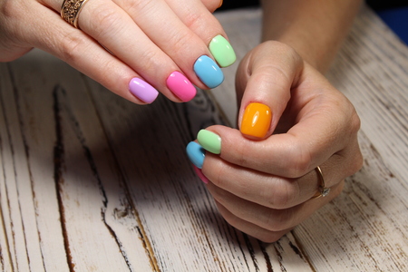 beautiful manicure design on a stylish backgroundの写真素材