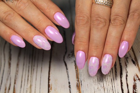 sexy manicure of nails on beautiful female hands