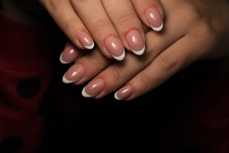 sexy French manicure on long beautiful nailsの写真素材