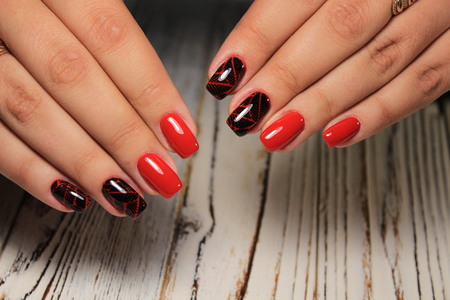 fashion manicure nails on white textural backgroundの写真素材