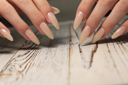 beautiful fashion manicure on a stylish textural background