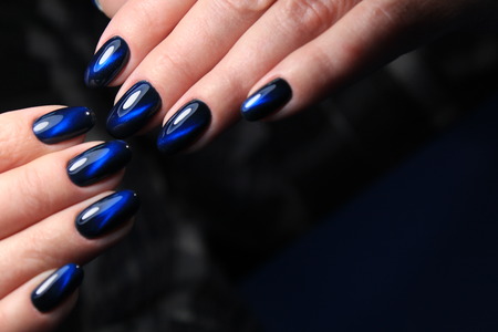 Fashion nails manicure on beautiful female handsの写真素材