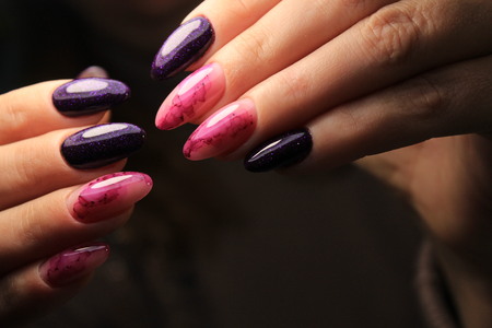 beautiful fashion manicure with a design on long nailsの写真素材