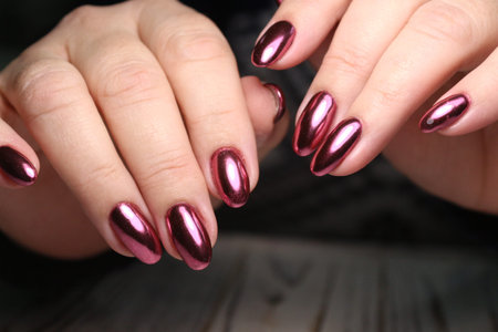 beautiful fashion manicure on a stylish textural background