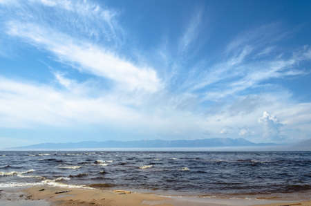 UST-BARGUZIN, BURYATIA, RUSSIA - JUNE 22.2021: view of the Svyatoy Nos Peninsula from the shore of Lake Baikal.の写真素材