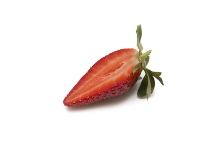 one half strawberry white  background horizontalの写真素材
