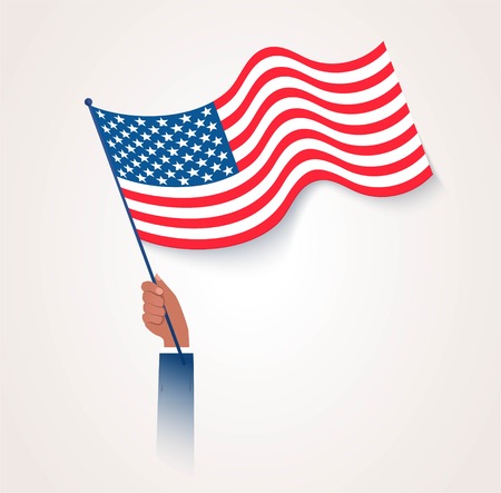 Hand Holding Up American Waving Flag. Vector illustration flat design. Isolated on grey background.のイラスト素材