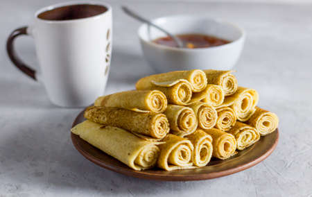 homemade pancakes, delicious, healthy food, tea drinking on a gray concrete backgroundの写真素材