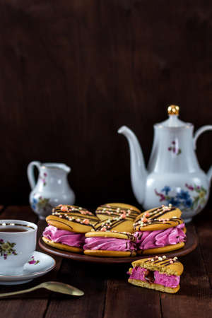 French tea party in a rustic style, homemade tender marshmallows with cookies, on a wooden tableの写真素材