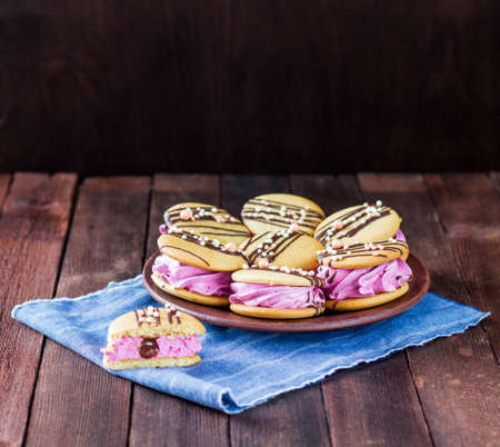 French tea party in a rustic style, homemade tender marshmallows with cookies, on a wooden tableの写真素材