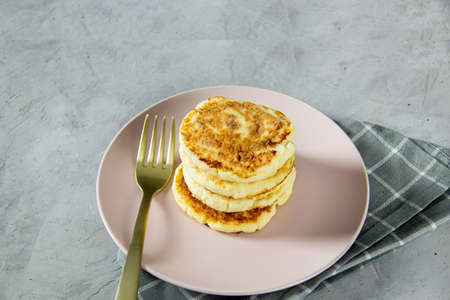 Fried curd cheese pancakes. Healthy, delicious kids food for the whole family. Serving lunch, close-upの写真素材