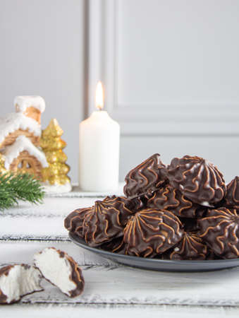 White Marshmallow in chocolate. light evening treatmentの写真素材