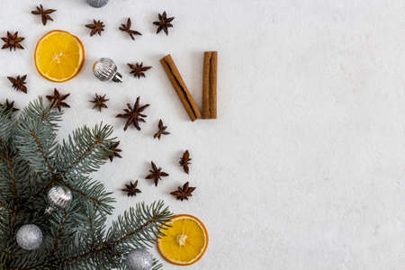 Winter holiday theme oranges and gifts and clocks with Christmas decorations and spruce. flat lay. bannerの写真素材