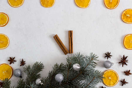 Winter holiday theme oranges and gifts and clocks with Christmas decorations and spruce. flat lay. bannerの写真素材