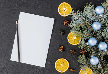 postcard, frame, banner on black concrete from above with letter. new year. flat lay.の写真素材