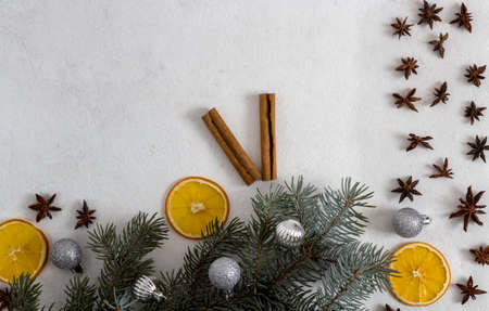 Winter holiday theme oranges and gifts and clocks with Christmas decorations and spruce. flat lay. bannerの写真素材