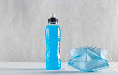 a bottle of isotonic energy drink, sport will beat diseasesの写真素材
