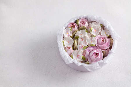 homemade Zephyr in a gift box, a beautiful delicate bouquet of Zephyr flowers, a holiday concept, giftsの写真素材