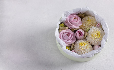 homemade Zephyr in a gift box, a beautiful delicate bouquet of Zephyr flowers, a holiday concept,...
