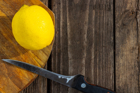 Lemons. On a wooden board.の写真素材