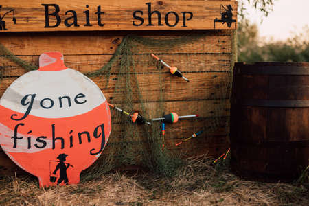 Wooden structure stands in the grass in nature in the villageの写真素材