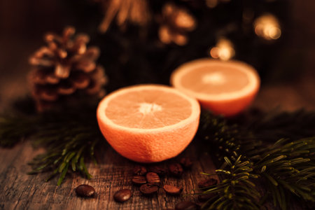 Christmas decorations oranges, cones and Christmas treeの写真素材