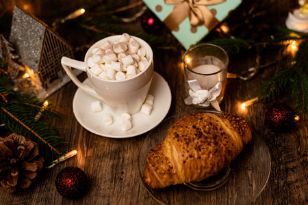 Christmas sweets. Croissant and marshmallow on the New Year's table. Romantic Family Evening. High quality photoの写真素材