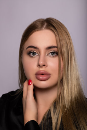 Emotional portrait of a beautiful young woman. Facial Skin Care. High quality photoの写真素材