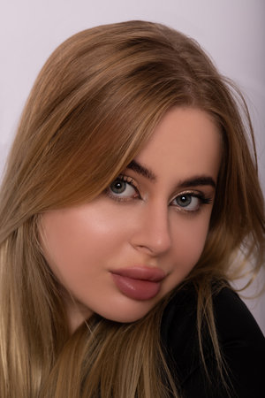 Emotional portrait of a beautiful young woman. Facial Skin Care. High quality photoの写真素材